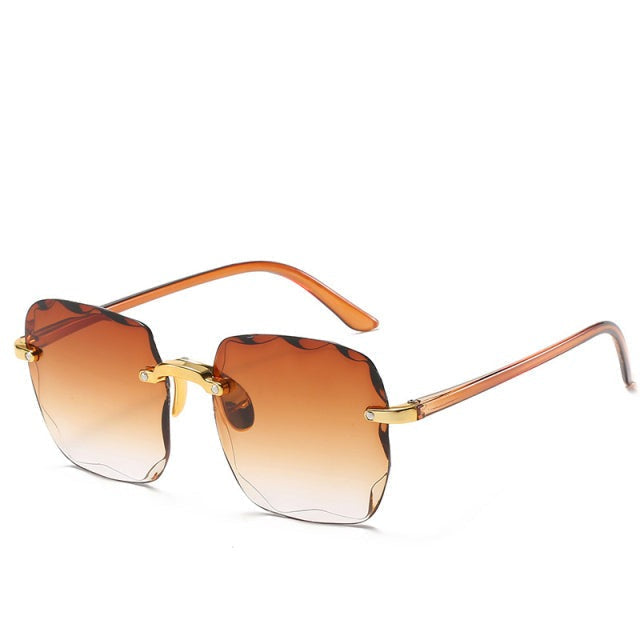 Trendiga randlösa solglasögon med UV400-skydd i vintage-look – Clea
